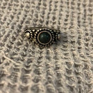 Antique inspired ring with dark green stone
